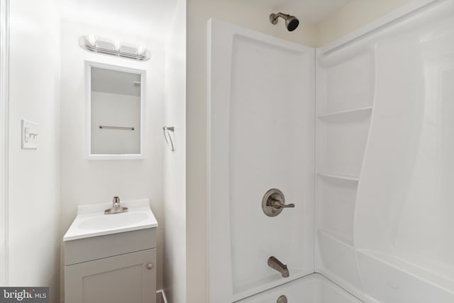 bathroom with vanity and shower / bath combination