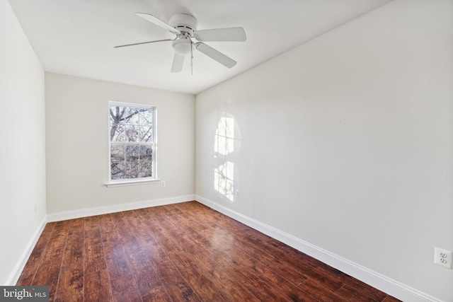 unfurnished room featuring dark hardwood / wood-style flooring and ceiling fan