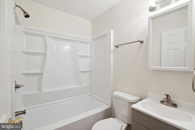 full bathroom with shower / washtub combination, toilet, and vanity