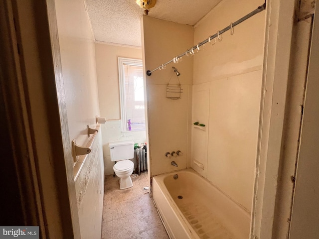 bathroom with bathtub / shower combination, a textured ceiling, toilet, and tile flooring