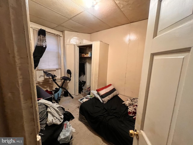 bedroom with a paneled ceiling