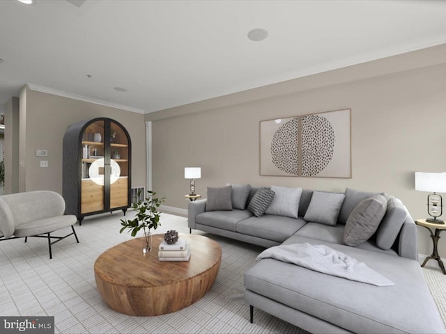 living room with ornamental molding