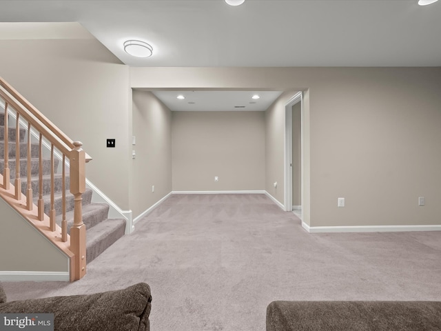 basement with light carpet