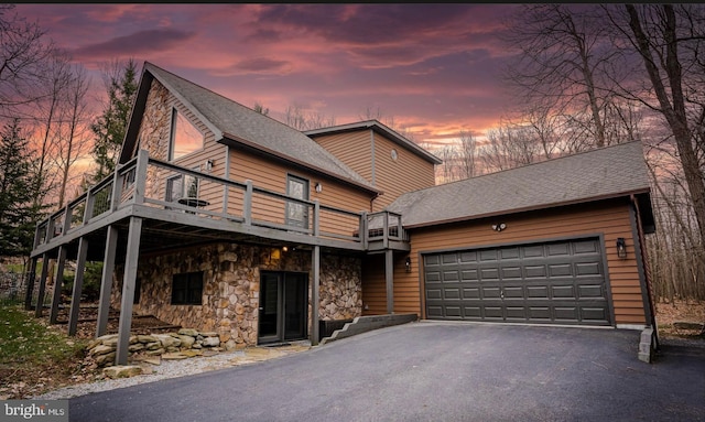 view of front of house featuring a balcony