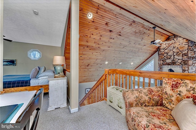 bedroom featuring lofted ceiling, a fireplace, a textured ceiling, wood ceiling, and carpet