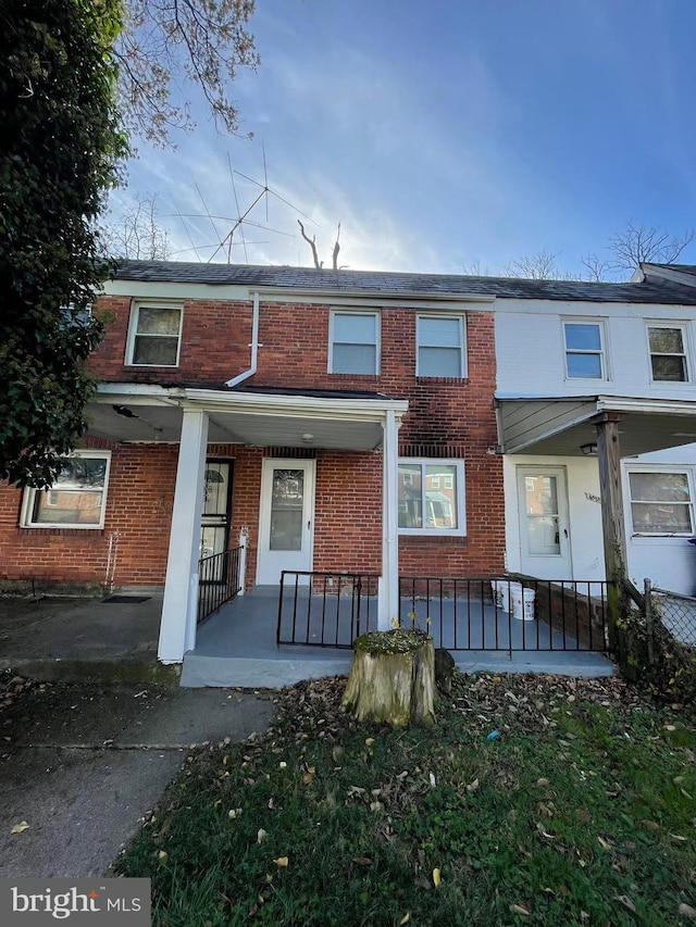 4826 Beaufort Ave, Baltimore, MD 21215 - view of front facade featuring a porch