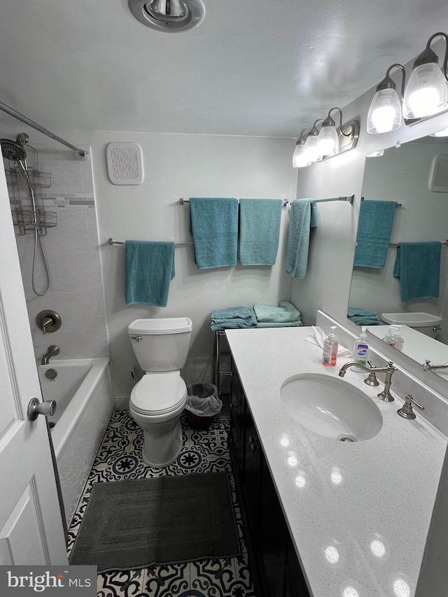 full bathroom featuring tub / shower combination, tile flooring, toilet, and oversized vanity