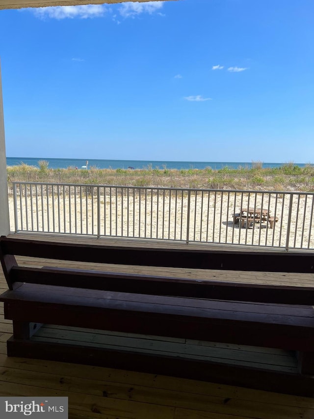 deck featuring a water view