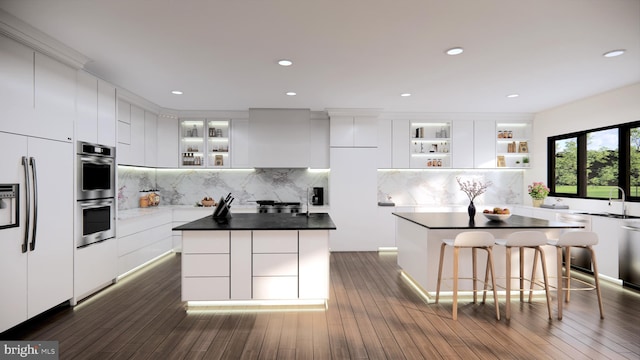 kitchen featuring a center island and white cabinetry