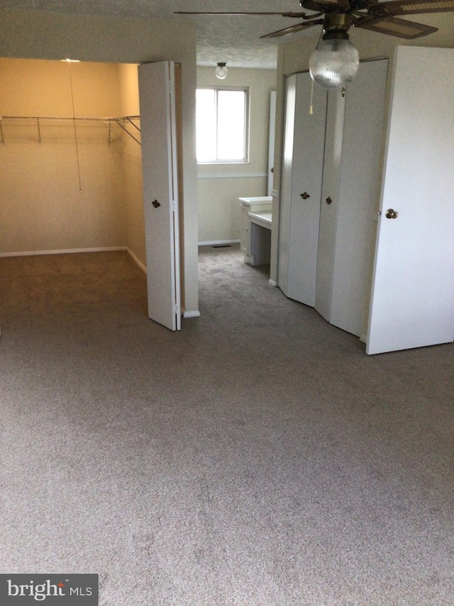 unfurnished bedroom with carpet flooring