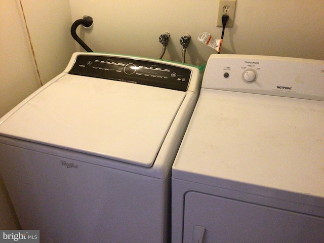 washroom featuring washer hookup and washer and dryer