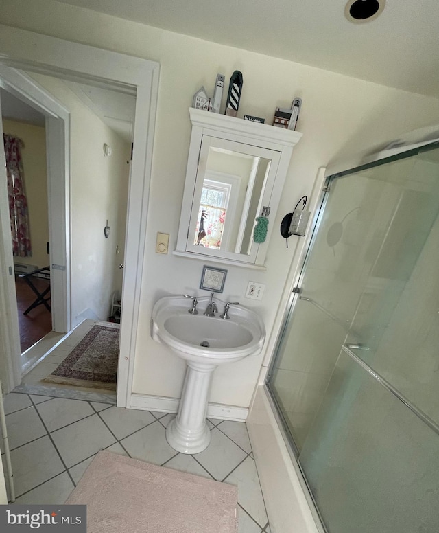 bathroom featuring tile patterned flooring