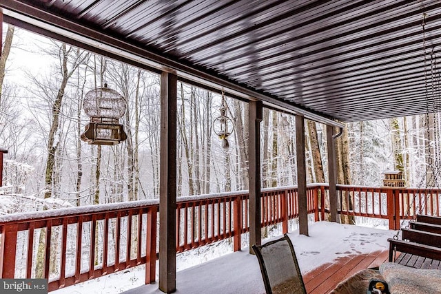 view of snow covered deck