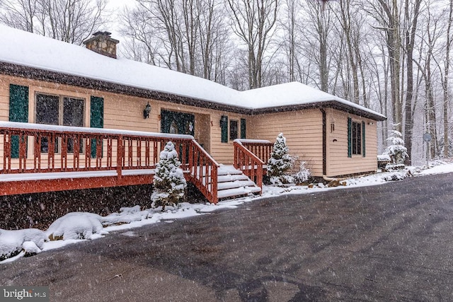 single story home with a deck