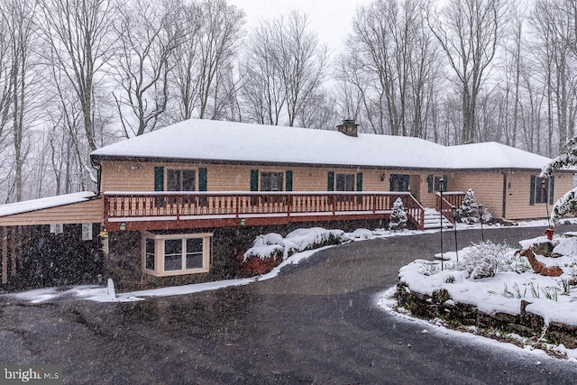 view of front of home featuring a deck