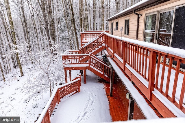 view of snow covered deck