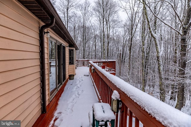 view of snow covered deck