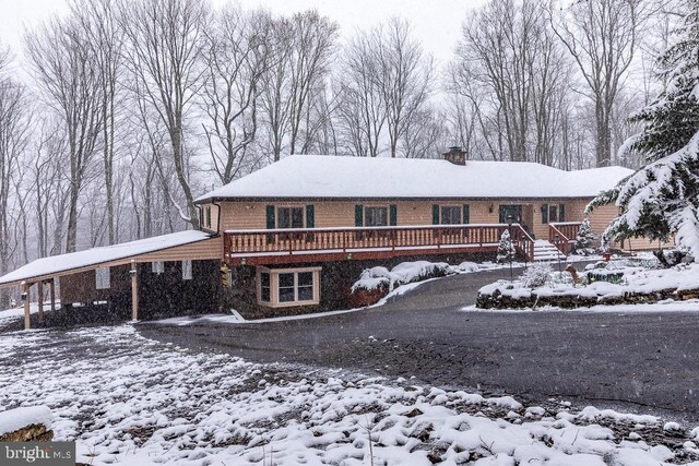 view of front of property with a deck