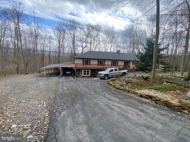 view of front of house with a carport