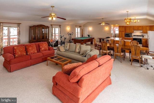 carpeted living room featuring lofted ceiling, billiards, and ceiling fan with notable chandelier