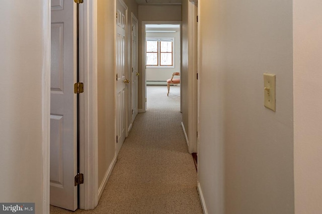 hallway with light carpet