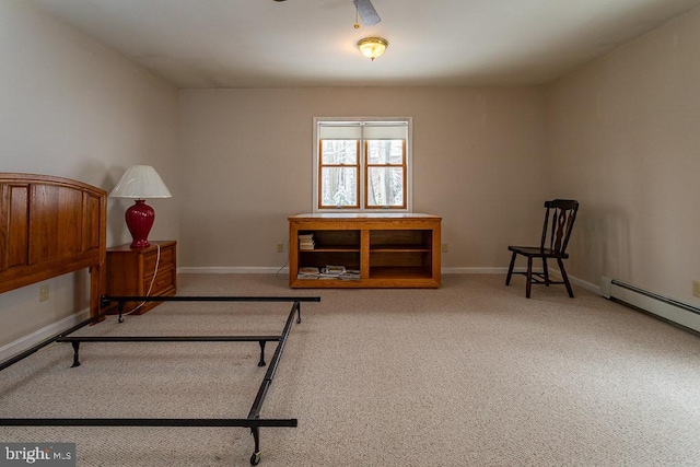 sitting room featuring ceiling fan, a baseboard radiator, and light colored carpet