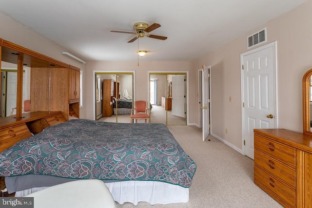 bedroom with light colored carpet and ceiling fan