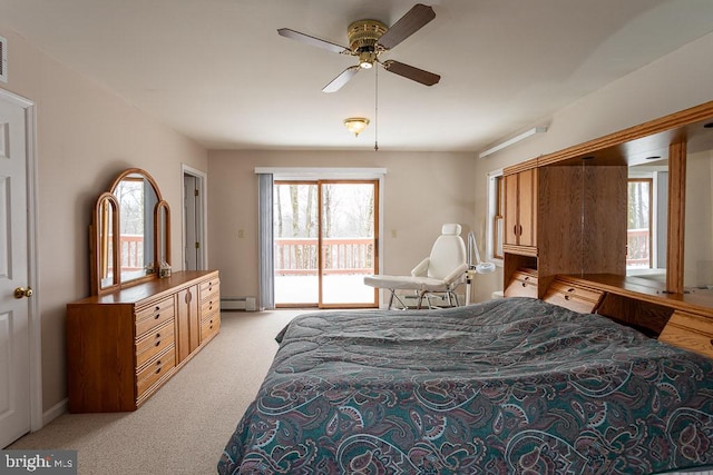 bedroom featuring light carpet, a baseboard heating unit, access to exterior, and ceiling fan