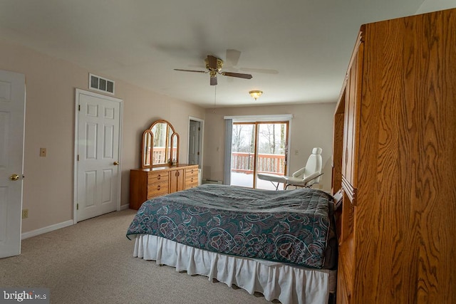 bedroom featuring ceiling fan, light carpet, and access to exterior