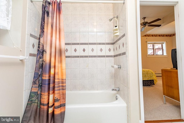 bathroom featuring shower / tub combo with curtain, baseboard heating, and ceiling fan