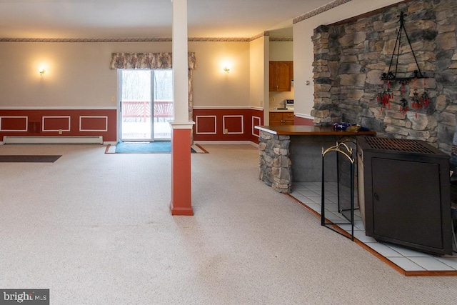 living room with light colored carpet and a baseboard radiator