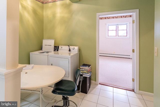 clothes washing area with light carpet, independent washer and dryer, baseboard heating, and decorative columns