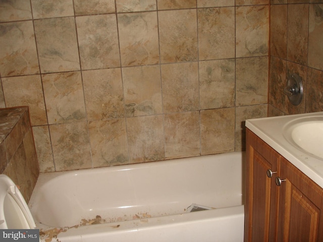 full bathroom with vanity, shower / washtub combination, and toilet