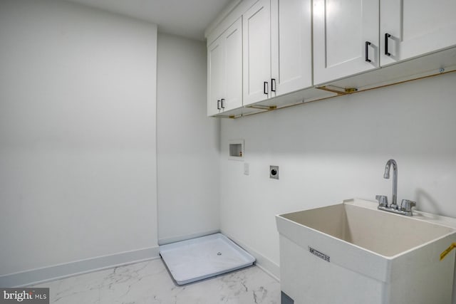 laundry room with cabinets, electric dryer hookup, sink, and hookup for a washing machine