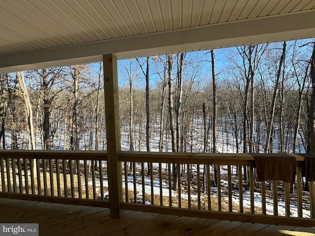 view of snow covered deck