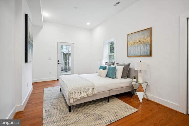 bedroom with light hardwood / wood-style floors