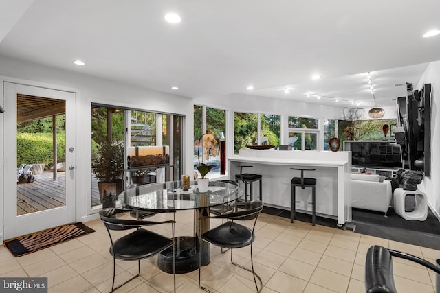 dining room with french doors and light tile flooring