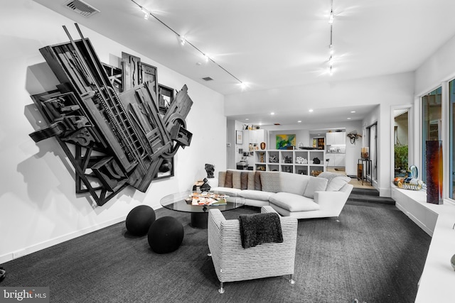 living room featuring track lighting