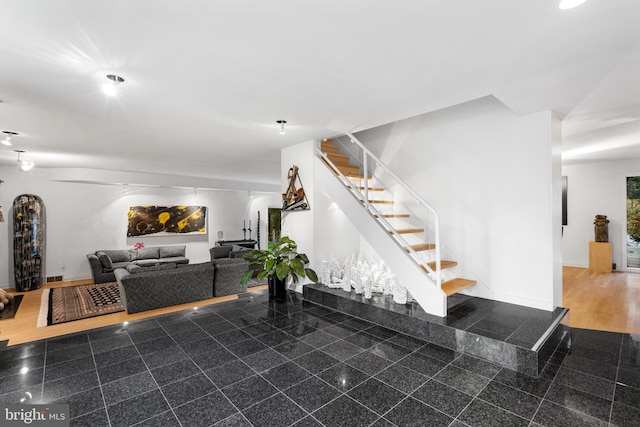 stairway with wood-type flooring