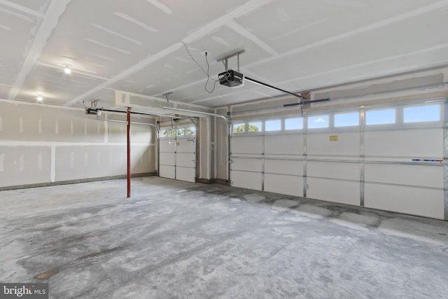 garage featuring a garage door opener