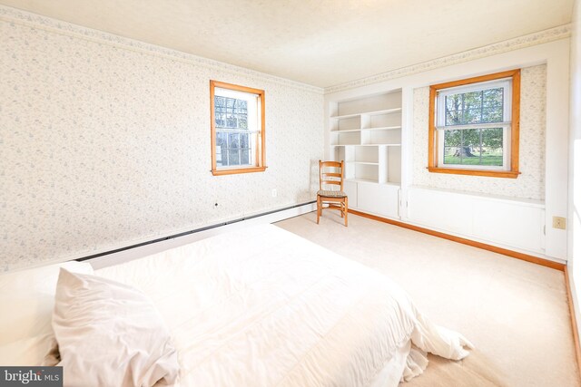 carpeted bedroom with wallpapered walls