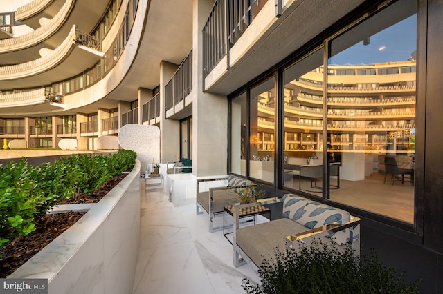 interior space with a balcony