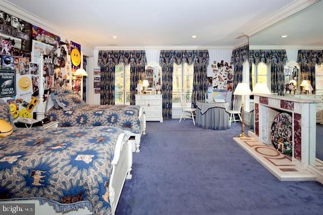 bedroom with ornamental molding and dark carpet