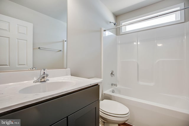 full bathroom with shower / washtub combination, toilet, and vanity