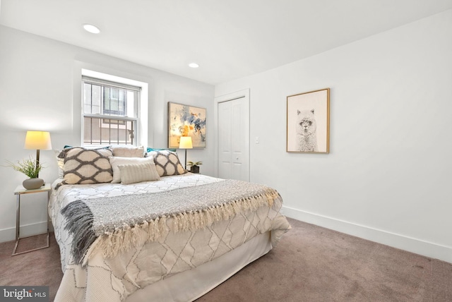 carpeted bedroom with a closet