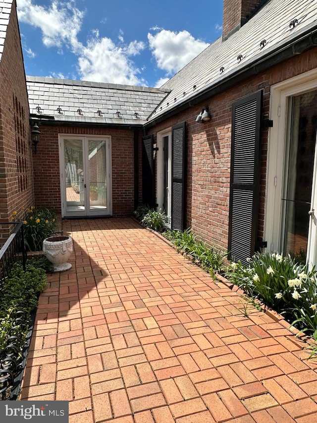 view of patio featuring french doors