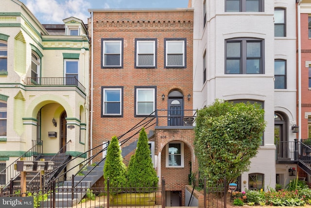 view of property with a balcony