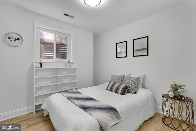 bedroom featuring light hardwood / wood-style floors