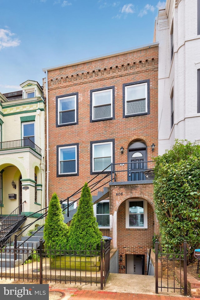 view of property with a balcony