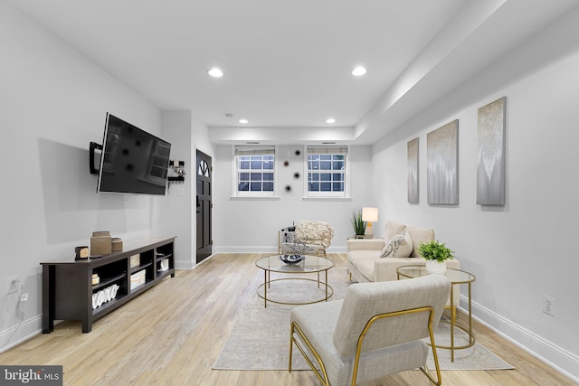 living room with light hardwood / wood-style floors